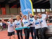 Fotos Ekiden 2022 lopers met medaille